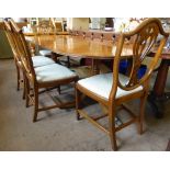 A Reproduction Twin Pedestal Regency Style Oval Dining Table, with swept feet and ball and claw