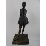 After Degas, a bronze statuette depicting a ballerina, approx 34 cms.