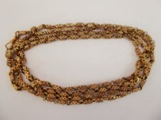 A Victorian 9 ct Yellow Gold Muff Chain, approx 140 cms, 36 gms.