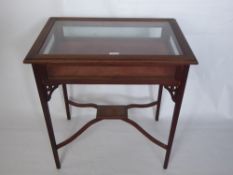 A Glass Topped Display Cabinet, on straight legs, approx 69 x 46 x 74 cms.