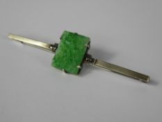 An Art Deco Apple Green Stone Marcasite Brooch.