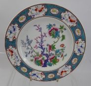 Twelve Famille Rose Style Cabinet Plates, depicting a floral scene and having a border with floral