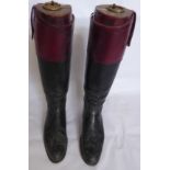 A Pair of Gentleman's Tan and Black Riding Boots, with fitted lasts.