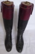 A Pair of Gentleman's Tan and Black Riding Boots, with fitted lasts.