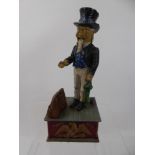 An American Cast Metal "Uncle Sam" Money Box, mechanism is working, approx 28 cms.