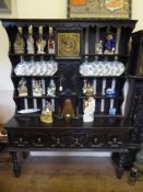 A 19th Century Welsh Clock Face Dresser, with slatted back, three shelves to either side and three