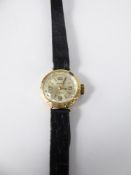 A Lady's Sekonda 9ct Gold Wrist Watch, the watch having champagne face with baton numeric dial,