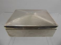 A Silver Cigarette Box, Chester hallmark, dated 1938/39, mm Walker & Hall, approx 11 x 9 x 4 cms,