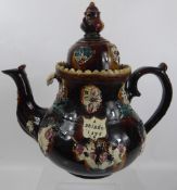 A Large Antique Decorative Barge Wear Tea Pot, hand painted with flowers and birds and bearing two