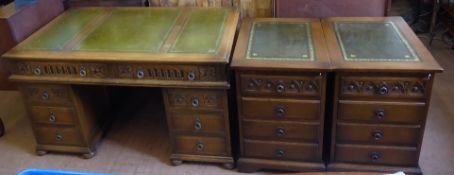 An "Old Charm" Office Suite, comprising tooled green leather surface twin pedestal desk. approx