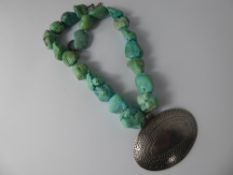 A Rough Cut Turquoise Beaded Necklace, approx 46 cms