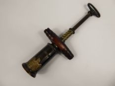 An 19th Century Bronze 'Thompson Patent' Cork Screw, together with a 'The Challenge cork screw. (2)