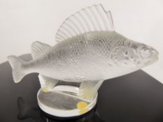 A Lalique Frosted-Glass Bonnet Ornament modelled as a 'Perch', raised on a circular base with