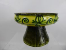 A Studio Pottery Green and Yellow Glazed Tazza, circular design to base with foliate decoration to