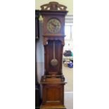 An Arts & Crafts Long Case Clock, with hand-worked brass and copper face and pendulum, approx 230