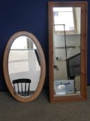 A Pine Mirror, approx 99 x 39 cms, together with a pine oval mirror approx 43 x 70 cms.