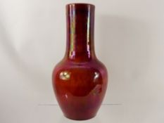 A Chinese 'Sang de Boeuf' Bottle Vase, approx 32 cms.