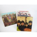 A Collection of Beatles LP Records, including 'Lonely Hearts Club Band', 'Rubber Soul', George