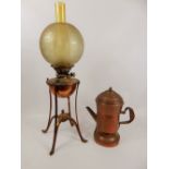 A Late 19th Century Copper Oil Lamp, on tripod base together with a vintage copper coffee percolator