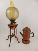 A Late 19th Century Copper Oil Lamp, on tripod base together with a vintage copper coffee percolator