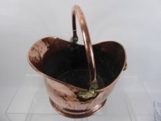 An Antique Polished Copper Coal Scuttle.