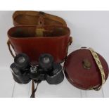 A Pair of Vintage German Breitfeld Binoculars, in the original leather case together with a