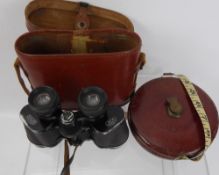 A Pair of Vintage German Breitfeld Binoculars, in the original leather case together with a