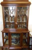 An Edwardian Inlaid Mahogany Display Cabinet, the top with two astral glazed doors, cupboard beneath