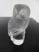A Lalique Frosted-Glass Seated Owl, etched Lalique to the side, approx 10 cms.
