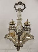 A Victorian Four Piece Silver and Cut Glass Cruet Set, London hallmark, dated 1861/2, on a tray,