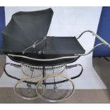 A Vintage 'Marmer' Steel Framed Baby Carriage, C-Spring chassis, cushioned with leather suspension