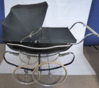 A Vintage 'Marmer' Steel Framed Baby Carriage, C-Spring chassis, cushioned with leather suspension