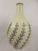 Alfred Read for Poole Pottery, cream glaze with hand painted foliate decoration, approx 30 cms