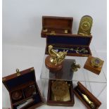 Six Nautical Items, including a brass telescope, letter opener, sundial compass, desk set (tape