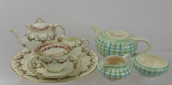 A Victorian 'Crescent' Toilette Set, on porcelain tray, including three small pots, a lidded