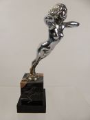 An Art Deco Style Brass and Chrome-Plated Bonnet Ornament, in the form of a female nude, raised on a