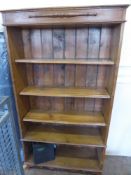 A Vintage Oak Book Shelf, with four shelves on bracket feet, approx 172 x 91 x 28 cms.