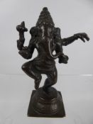 An Indian Bronze Figure of Ganesh, depicted jubilant, believed to be 19th Century), approx 17 cms.