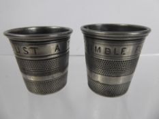 Two Pewter Tot Measures, in the form of large thimbles, inscribed 'Just a Thimble Full', approx 5.