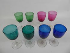 A Set of Six Bristol Green Wine Glasses, together with five green, four Bristol blue and four