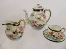 A Part Japanese Fine China Tea Set, comprising teapot, milk jug, sugar bowl, four cups and five