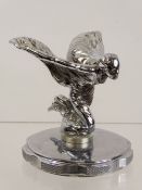 A Rolls Royce Kneeling 'Spirit of Ecstasy' Bonnet Ornament, US patent, stamped trademark reg, raised