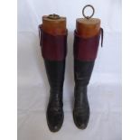 A Pair of Gentleman's Black Leather Riding Boots, with fitted lasts.