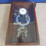A National Time Recorder 'Clocking In' Clock, presented in a glazed mahogany frame.