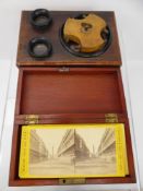 A Vintage Stereoscope, with approx 43 slides, some with titles.
