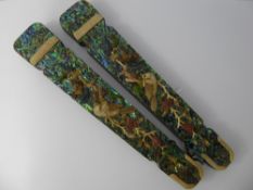 A Pair of Chinese Black Lacquer Scroll Weights, with abalone shell inlay with raised bone decoration