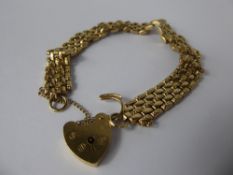 A 9 ct Yellow Gold Gate Link Bracelet, with 9 ct heart-form clasp, approx 20 gms