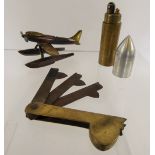 A Trench Art Model of a plane 'Seafire' (wf), together with a cigarette lighter in the form of a