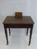 A Waring & Gillow Writing Table, with ebony inlay to edge and pop up cover to writing implement