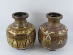 A Pair of Copper and Brass Pots, decorated in the Persian style, approx 29 cms high.